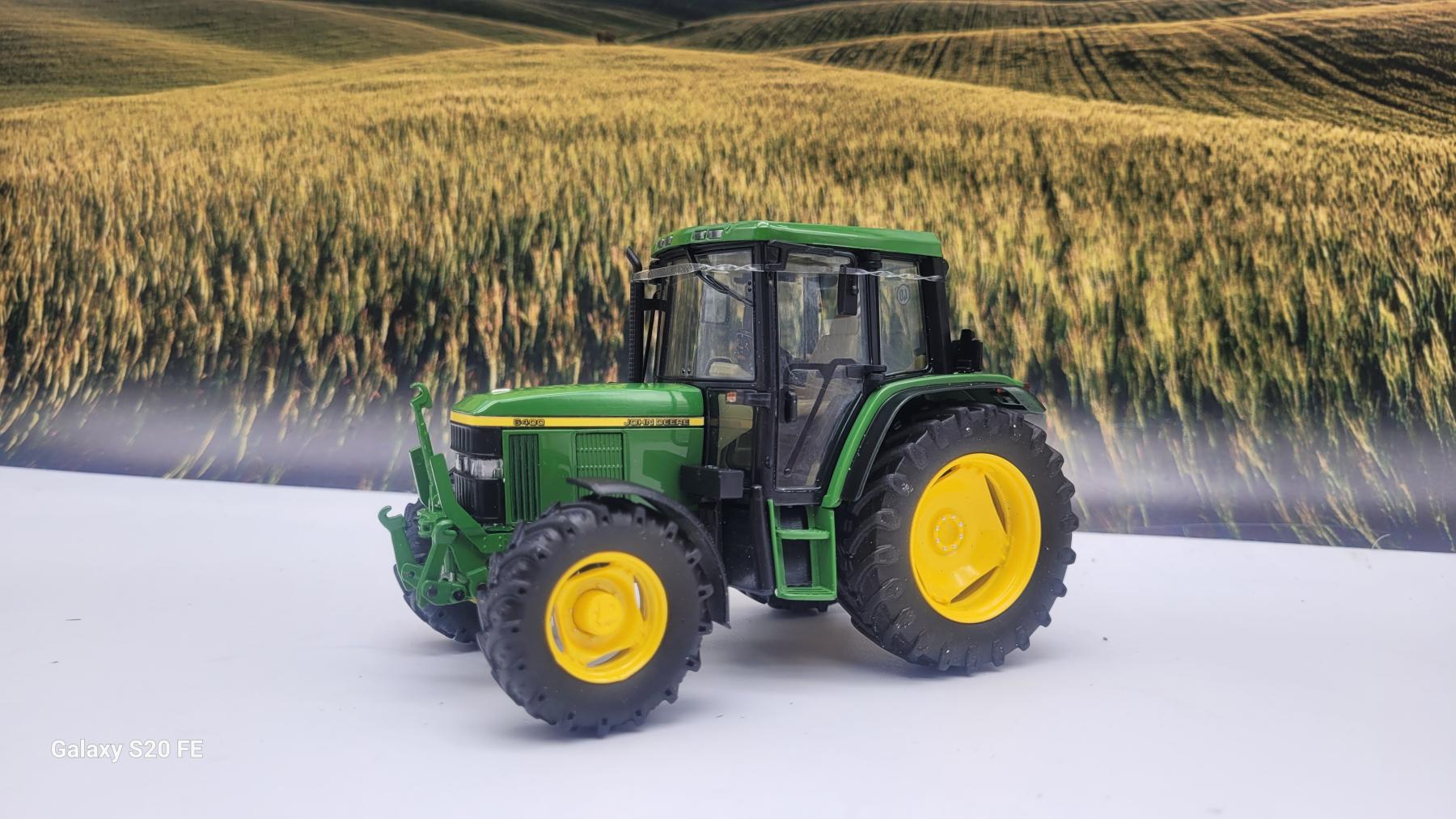 JOHN DEERE 6400 CON SOLLEVAMENTO FRONTALE